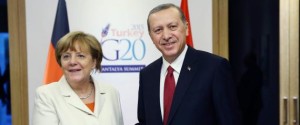 epa05028490 German Chancellor Angela Merkel (L) and Turkish President Recep Tayyip Erdogan shake hands during their bilateral meeting at the G20 Summit in Antalya, Turkey, 16 November 2015. In addition to discussions on the global economy, the G20 grouping of leading nations is set to focus on Syria during its summit this weekend, including the refugee crisis and the threat of terrorism. EPA/KAYHAN OZER/POOL
